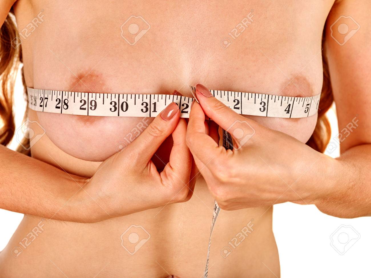 50990372-unrecognizable-girl-measures-her-nude-breast-measuring-tape.jpg