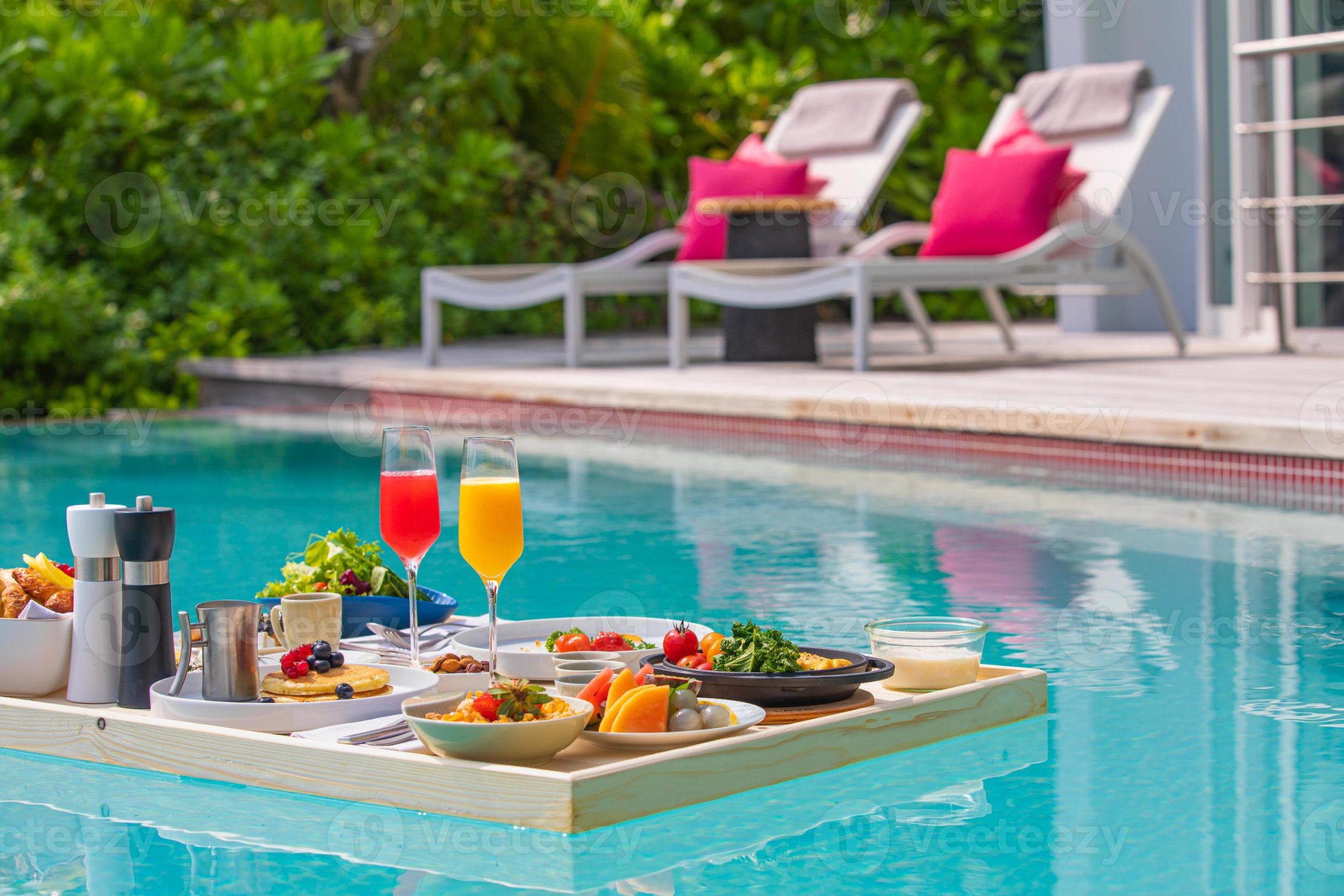 breakfast-in-swimming-pool-floating-breakfast-in-tropical-resort-table-relaxing-in-calm-pool-w...jpg